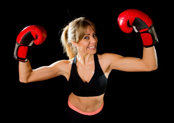 Young happy beautiful boxer girl with boxing gloves arms in victory sign with fit and healthy body — Stock Photo, Image