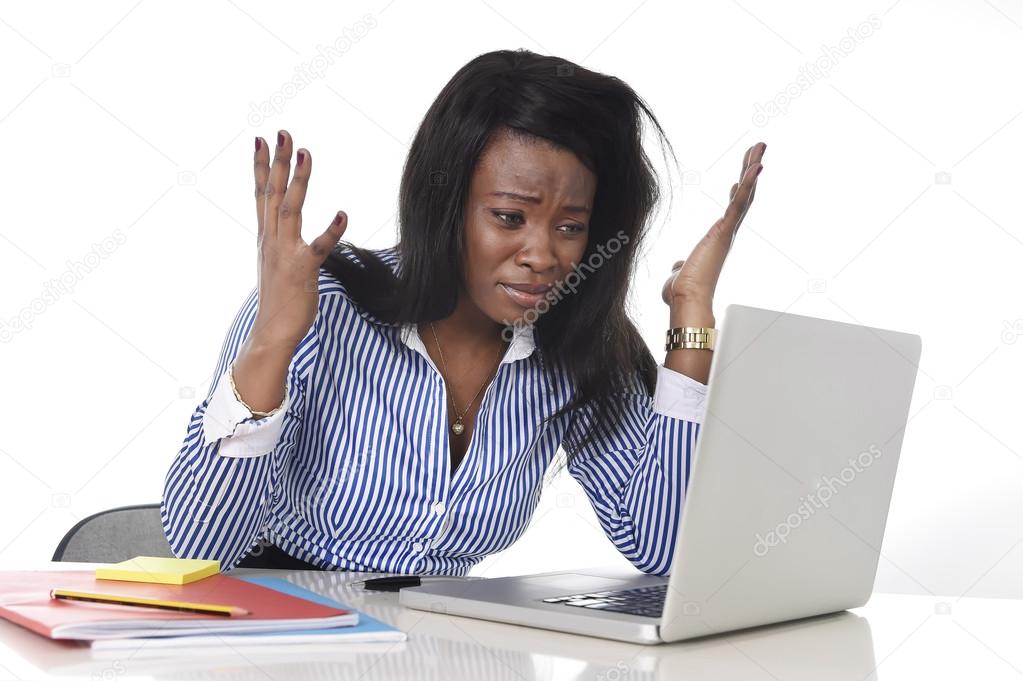 black African American ethnicity frustrated woman working in stress at office