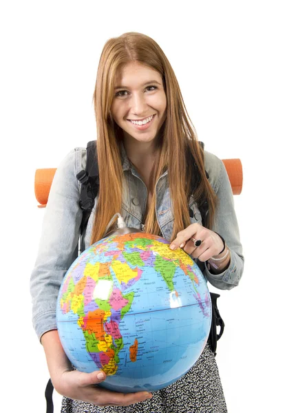 Beautiful student girl holding world globe in her hand choosing holidays destination in travel tourism concept — Stock Photo, Image