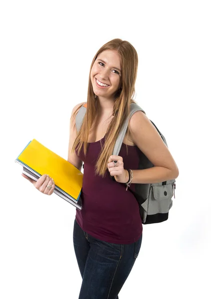 Unga vackra college student tjej bära ryggsäck och böcker poserar lycklig och säker i universitet utbildning koncept — Stockfoto