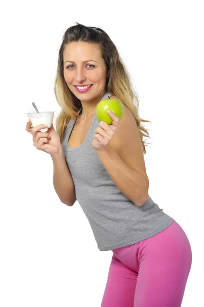 Sexy blond hair woman with fit slim body holding green apple fru — Stock Photo, Image