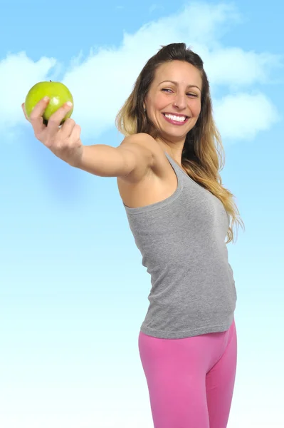Sexy beautiful woman holding green apple fruit in healthy natura — Stock Photo, Image