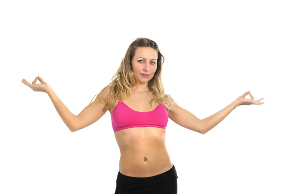 Sexy mooie vrouw met blond haar en sport kleding doen yoga houding van de handen van de lotus in top beha — Stockfoto