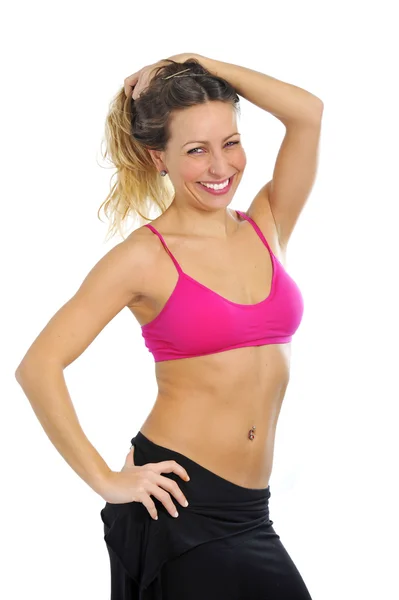 Jovem sexy bela mulher em roupas esportivas posando sedutor com top sutiã no conceito de fitness — Fotografia de Stock