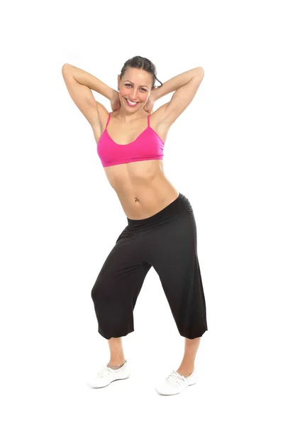 Jovem sexy bela mulher em roupas esportivas posando sedutor com top sutiã no conceito de fitness — Fotografia de Stock