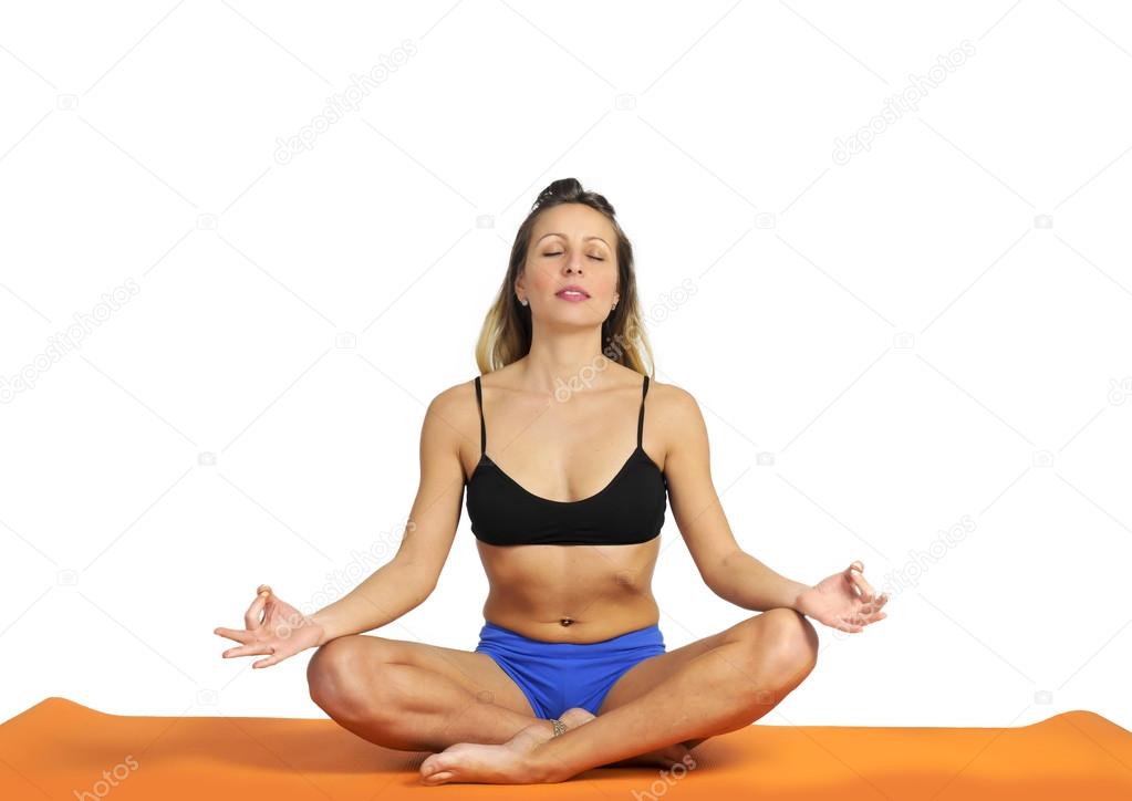 Young Sexy Attractive Fit Woman At Gym Doing Yoga Exercise And Position  Sitting On Mat In Meditation And Relax After Training Workout Isolated On  White Background Stock Photo, Picture and Royalty Free
