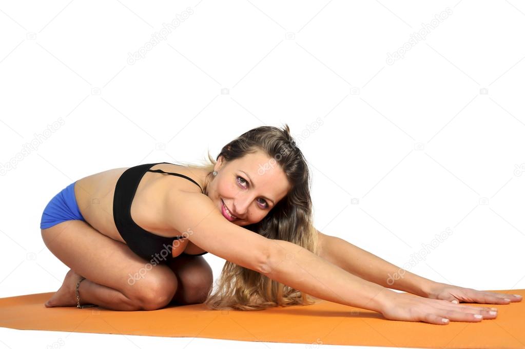 Young Sexy Attractive Fit Woman At Gym Doing Yoga Exercise And