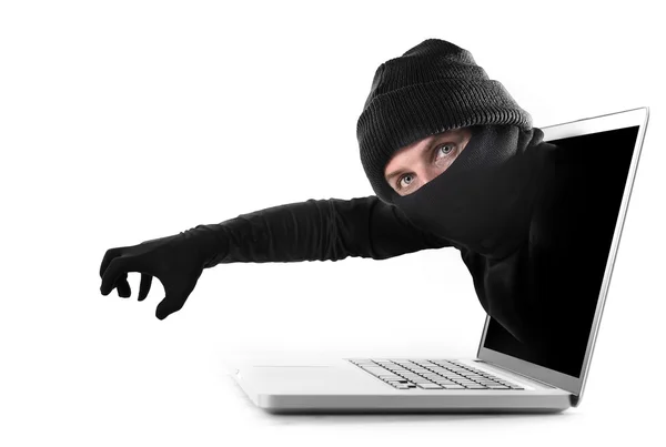 Hacker and cyber criminal man out computer screen with grabbing and stealing conceptual password hacking and cyber crime — Stock Photo, Image