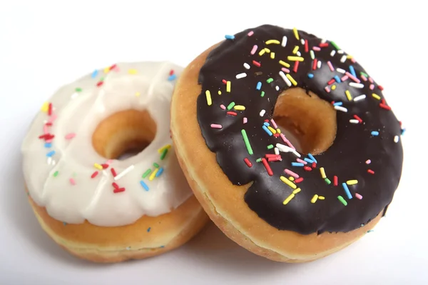 Tre läckra och frestande donuts med olika smak munkar och pålägg socker söt missbruk koncept — Stockfoto