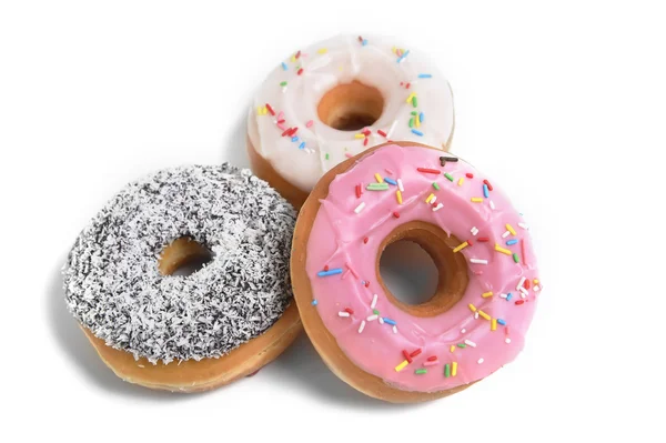Tre läckra och frestande donuts med olika smak munkar och pålägg socker söt missbruk koncept — Stockfoto