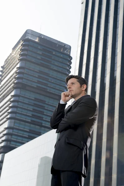 Corporate portrait young attractive businessman standing outdoors with attitude — Stock Photo, Image