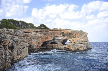 marine landscape with rock mountain cliff and sea horizon in Ibiza Spain