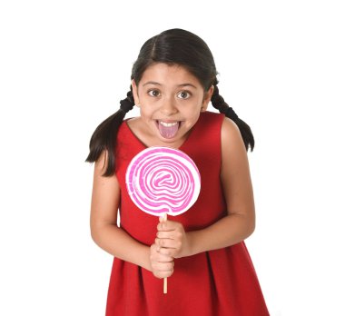 sweet beautiful latin female child holding big pink spiral lollipop candy