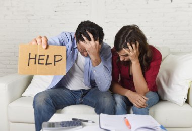 young couple worried at home in bad financial situation stress asking for help clipart