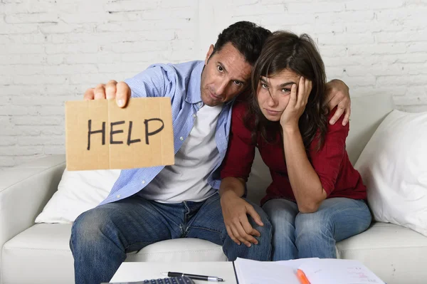 Young couple worried at home in bad financial situation stress asking for help — Stock Photo, Image