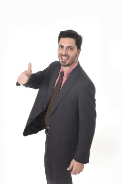 corporate portrait of young attractive businessman of Latin Hispanic ethnicity giving thumb up