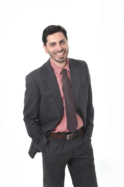 Corporate portrait of young attractive businessman of Latin Hispanic ethnicity smiling in suit and tie — Stok fotoğraf