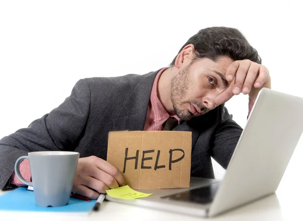 Businessman in suit and tie sitting at office desk working on co — Stok fotoğraf