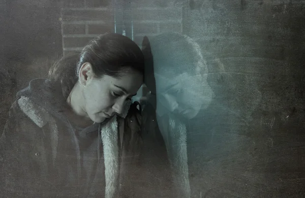 Sad woman alone leaning on street window at night suffering dep — Stok fotoğraf