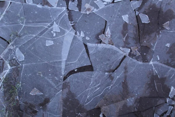 Buz kırılan buz parçaları kışın arka planında