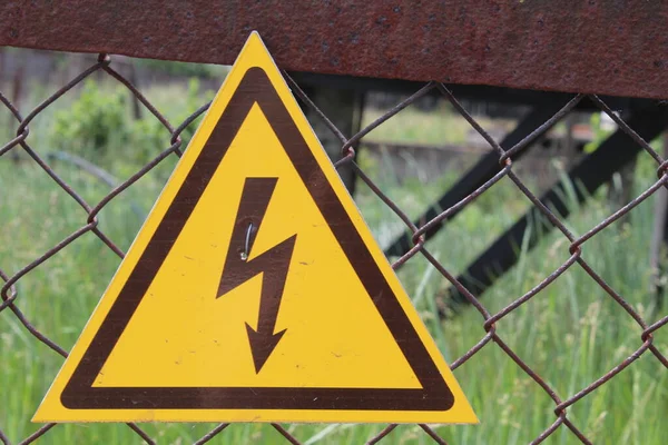 Sign Danger Dark Brown Lightning Yellow Triangle — Stock Photo, Image