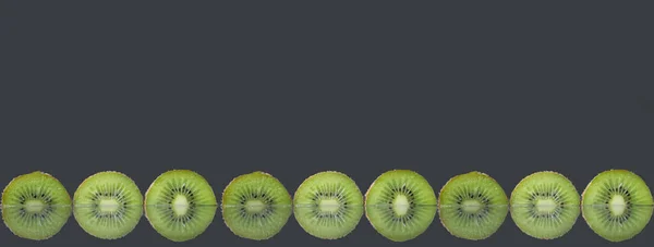 Two Three Circles Green Kiwi Semicircle Black Glossy Still Life — Stock Photo, Image