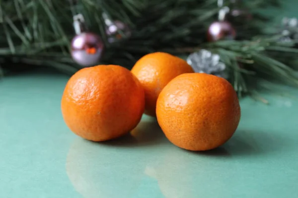 Two Three Citrus Tangerines Peel Unpeeled Lie Next Branch Spruce — Stock Photo, Image