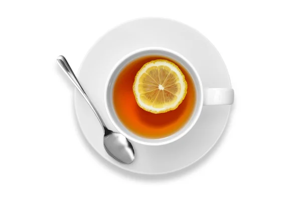 흰 배경에 레몬이 들어 있는 차 한잔 — 스톡 사진