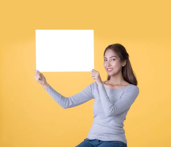 Asian Woman Casual Clothes Holding Empty Blank Board Isolated Yellow — Stock Photo, Image