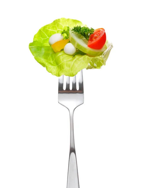 Смешанный салат на вилке — стоковое фото