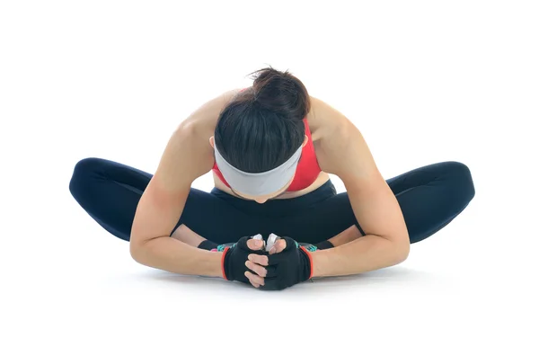 Mujer estirándose después de hacer ejercicio —  Fotos de Stock