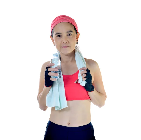 Mujer con toalla de ejercicio y agua —  Fotos de Stock