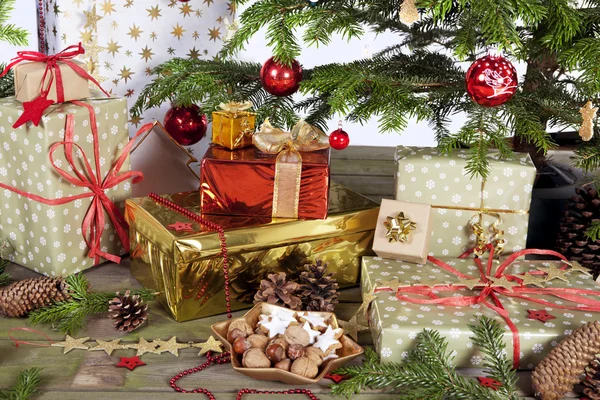 Many parcel under christmas tree — Stock Photo, Image