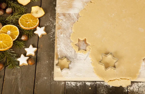 Cut out christmas cookies stars — Stock Photo, Image