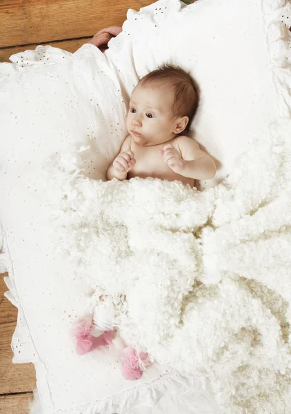 Baby with white blanket — Stock Photo, Image