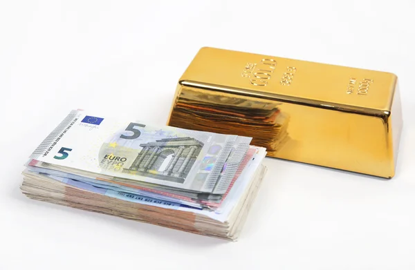 Dinheiro ou ouro — Fotografia de Stock