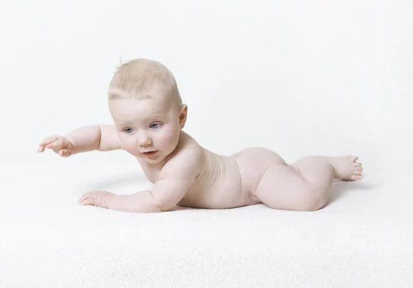 Naked baby lying on his stomach — Stock Photo, Image