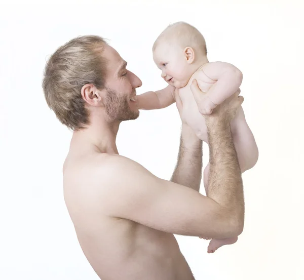 Father lifts up his baby — Stock Photo, Image