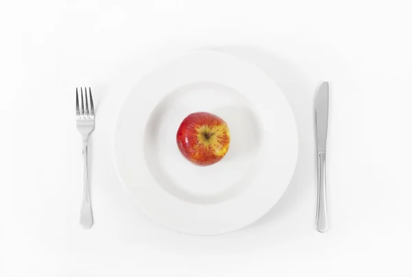 Manzana en plato — Foto de Stock