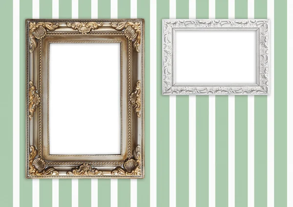 Picture frames on striped wall — Stock Photo, Image