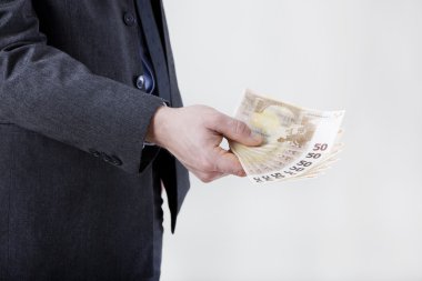 banknot ile işadamı