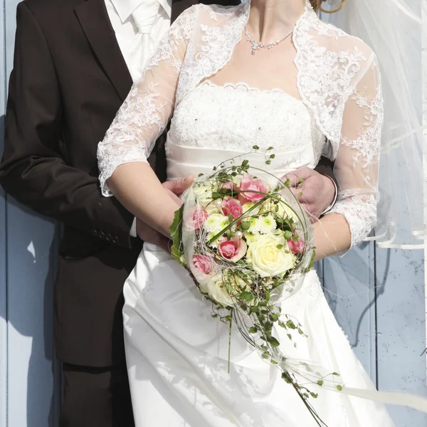 Bride is held by groom — Stock Photo, Image