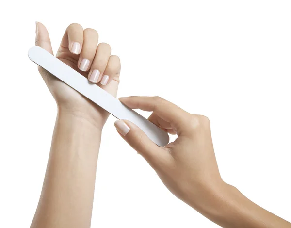 Woman cares for her fingernails — Stock Photo, Image