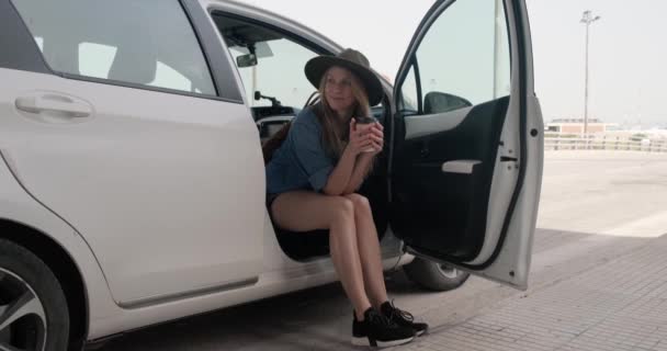 Girl Black Hat Sitting White Car — Stock Video