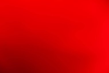 Fotoğraf, metin, dekorasyon ve grafik tasarımları için alanı olan bulanık kırmızı arkaplan dokusudur.