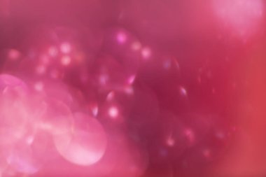 Mor parıltılı klasik ışık arka planı. Festivaller ve kutlamalar için odağından çıkarıldı