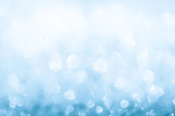 blue glitter background. Abstract Shiny glitter bokeh christmas background.
