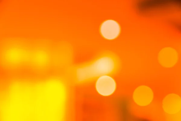 Bokeh barevné oranžové abstraktní pozadí — Stock fotografie
