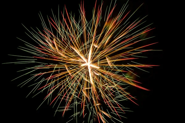 Brightly colorful fireworks a variety of colors in the sky at ni — Stock Photo, Image