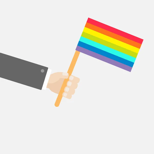 Empresario mano sosteniendo arco iris gay orgullo bandera . — Archivo Imágenes Vectoriales